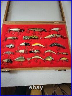 20 Vintage Fishing Lures 8 are wood 3 has glass eyes in case glass is cracked