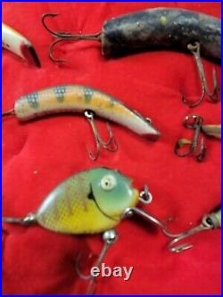 20 Vintage Fishing Lures 8 are wood 3 has glass eyes in case glass is cracked