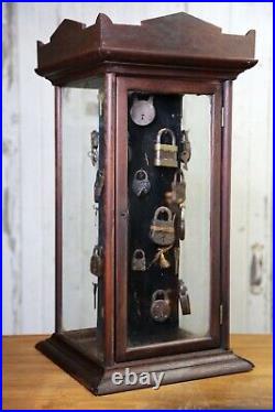 Antique store counter display case rotating cabinet vintage locks keys jewelry