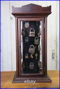 Antique store counter display case rotating cabinet vintage locks keys jewelry