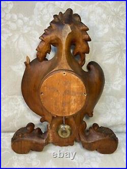 Black Forest Wall Clock Wood Case with Scrolls, Flowers, Shells & Wing Carvings
