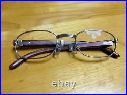 Cartier wood frame glasses with case