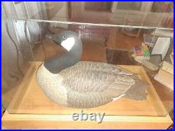 High art wood carving art work of Canada Goose in oak and glass case